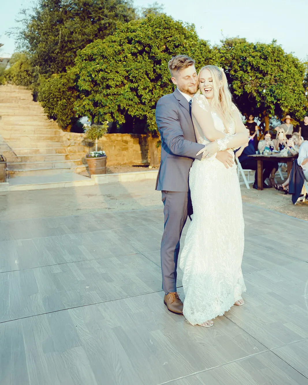 First dance on the courtyard dance floor at dusk