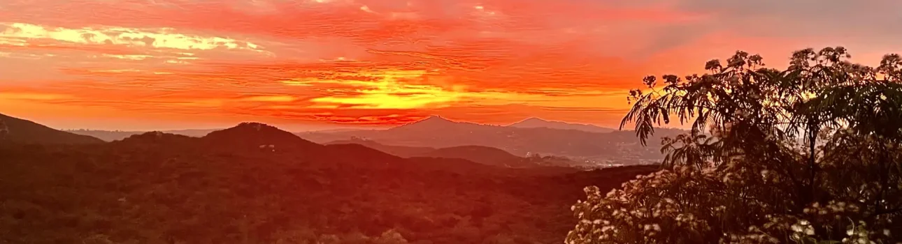 From this Event Venue San Diego we see a Breathtaking sunset over the rolling hills of Jamul, California, as seen from Villa San Giovese, a scenic vineyard-style event venue in San Diego